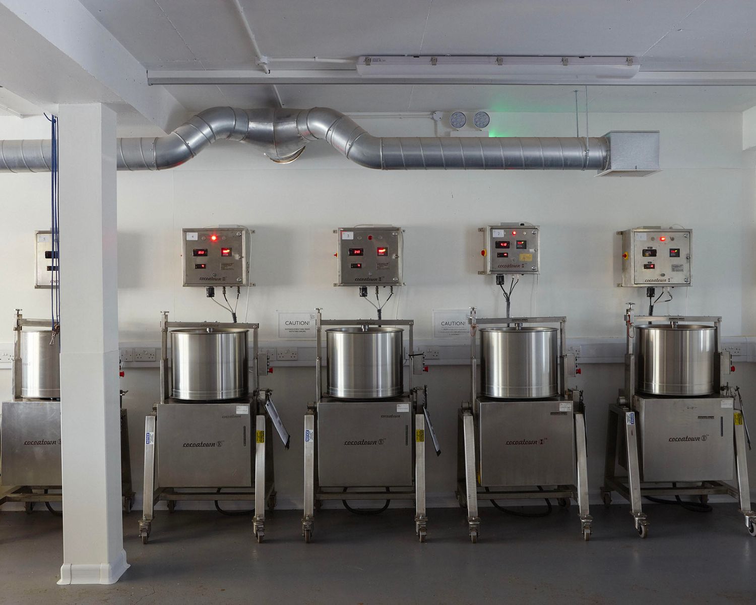 5 conch machines at our craft chocolate factory