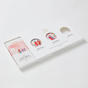 Side view showing Pump Street's Christmas chocolate gift box with sliding tray