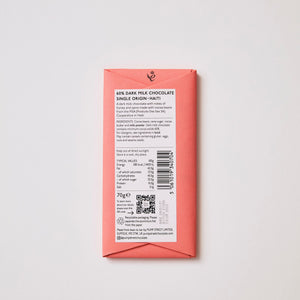 Rectangular chocolate bar packaging with text and a QR code on a light gray background