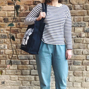 Customer carrying Pump Street Canvas Tote Bag