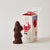 Chocolate Father Christmas Figure Next to Beautifully Illustrated Festive Box 