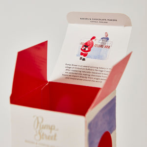 Detail of the top flap of the box containing chocolate Father Christmas