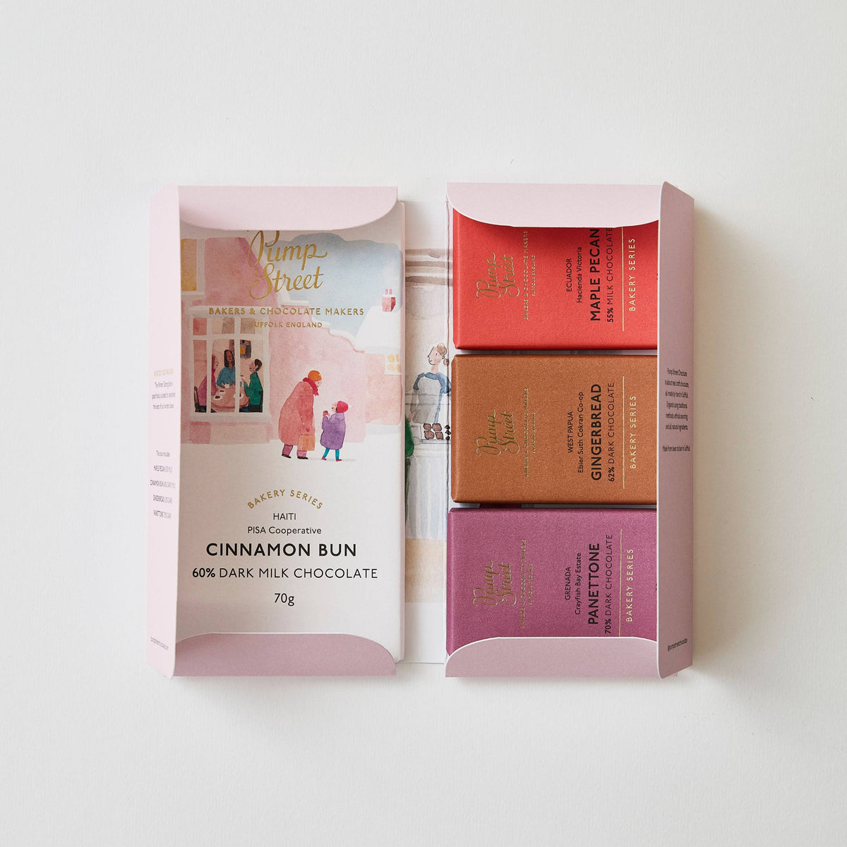 Chocolate bars in a pink packaging box on a white background